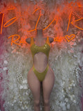 Gold rhinestone bodysuit with halter neckline and high-cut legs, front view