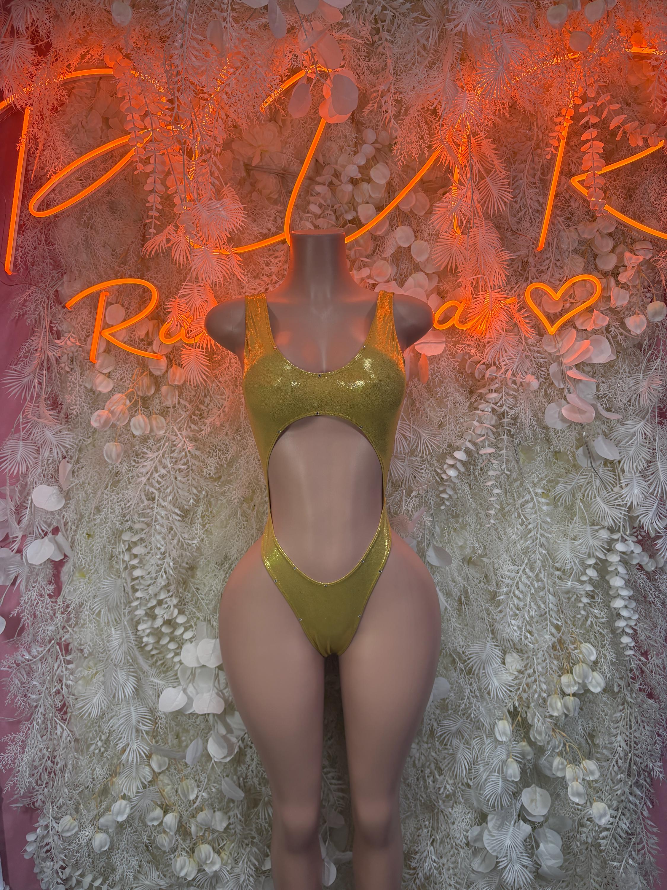 Gold rhinestone bodysuit with halter neckline and high-cut legs, front view
