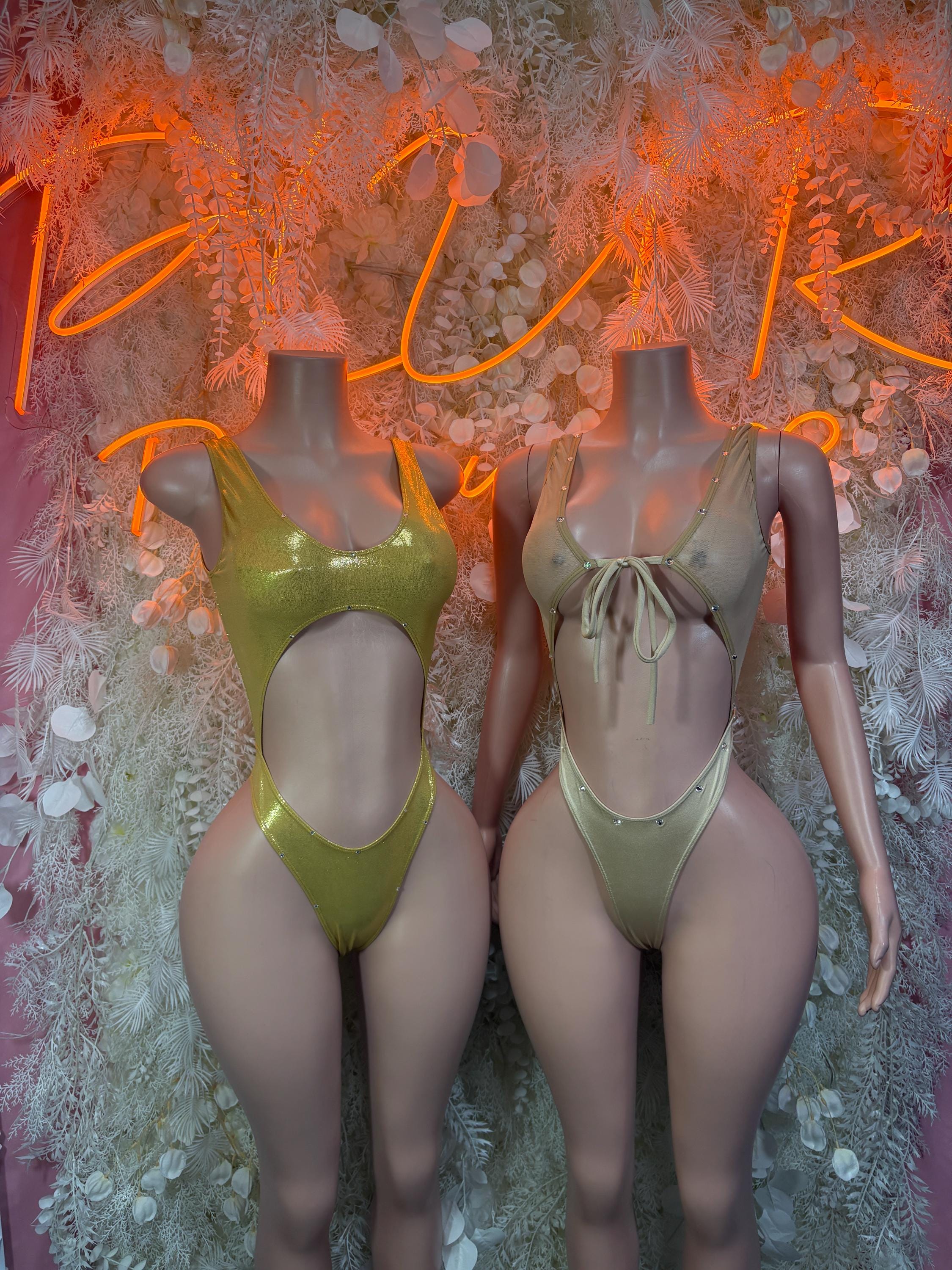 Pair of gold metallic halter bodysuits with tie-front and low-cut back