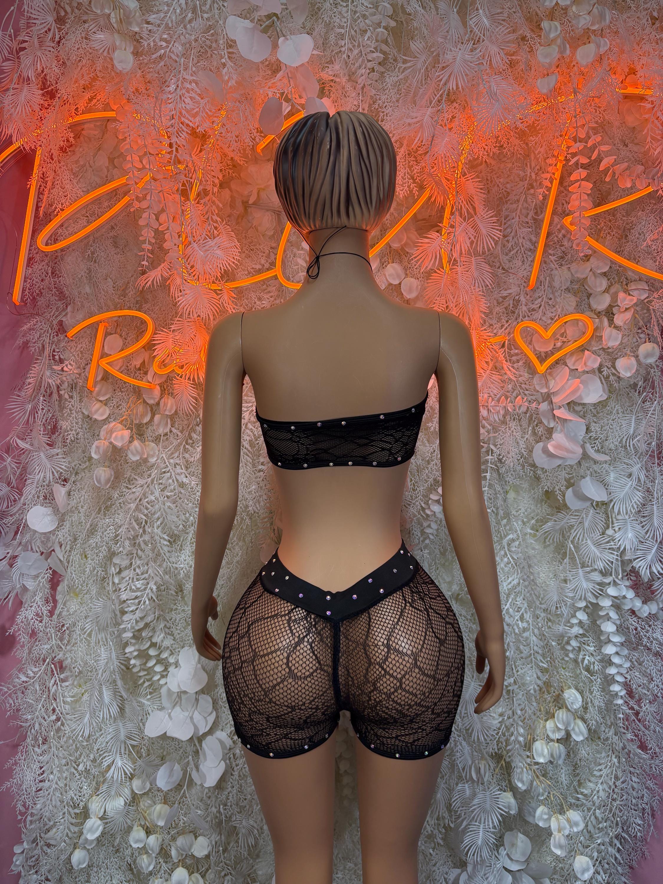 Black fishnet bodysuit set back view with bralette and high-waist shorts