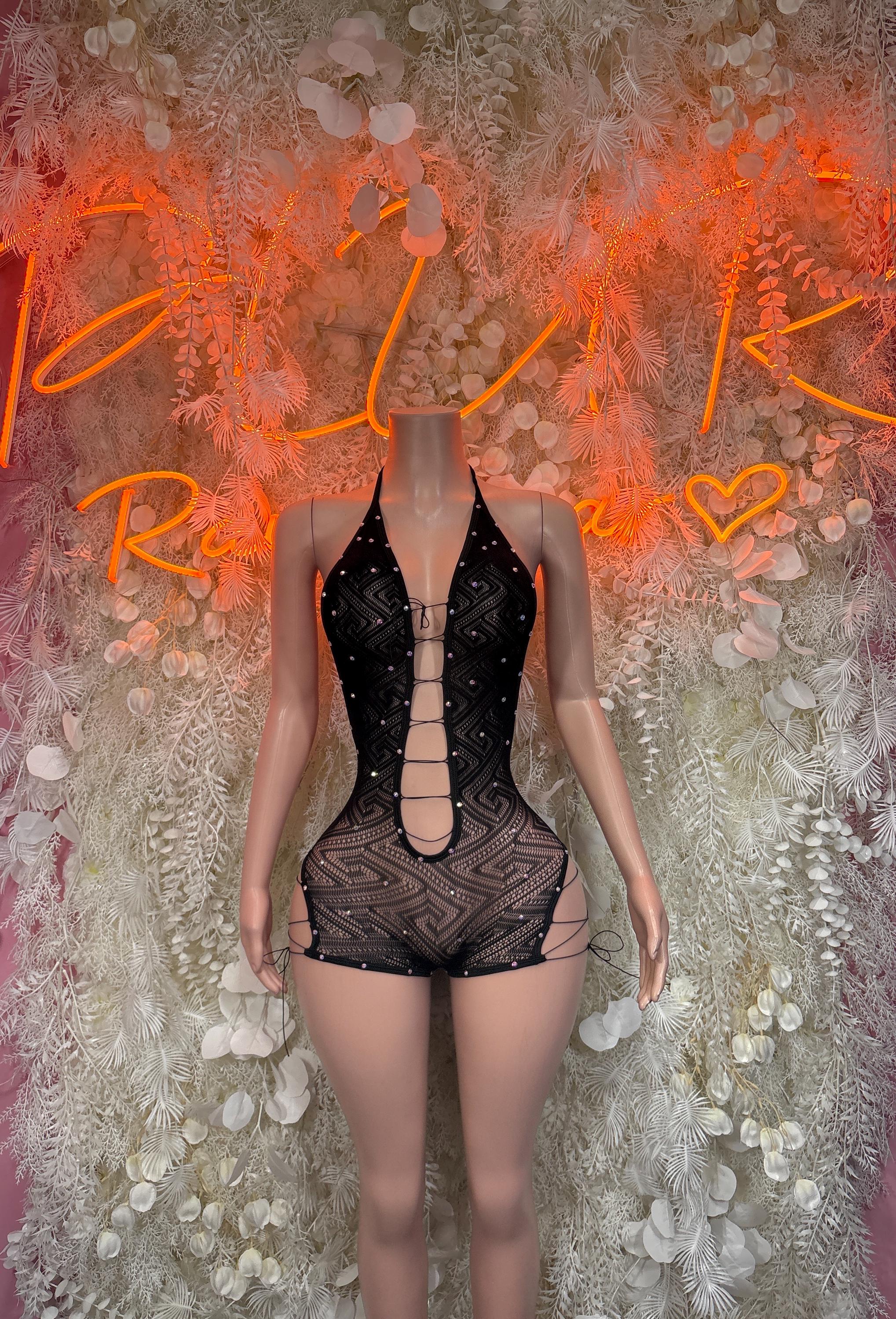Fishnet black one-piece bodysuit with front lace-up strappy neckline, short legs