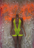 Neon green one-piece bodysuit with scoop neck and cutout side panels