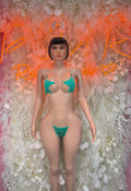 Two-piece green rhinestone bikini with triangle top and matching bottom