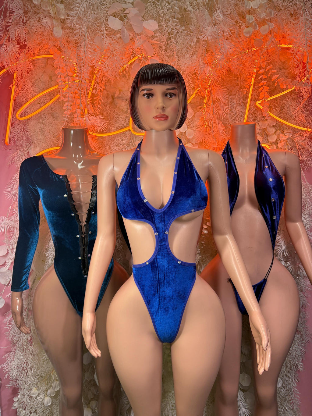 Blue velvet bodysuit with halter V-neck and cheeky high-leg cut