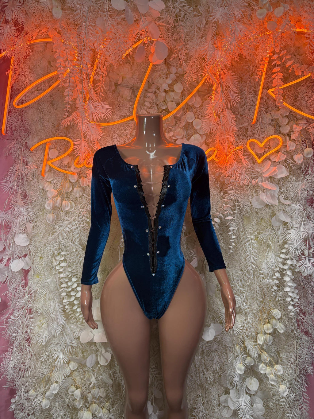 Blue glitter long-sleeve bodysuit with deep V neckline and front button detail