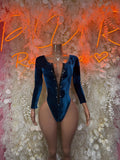 Blue glitter long-sleeve bodysuit with deep V neckline and front button detail