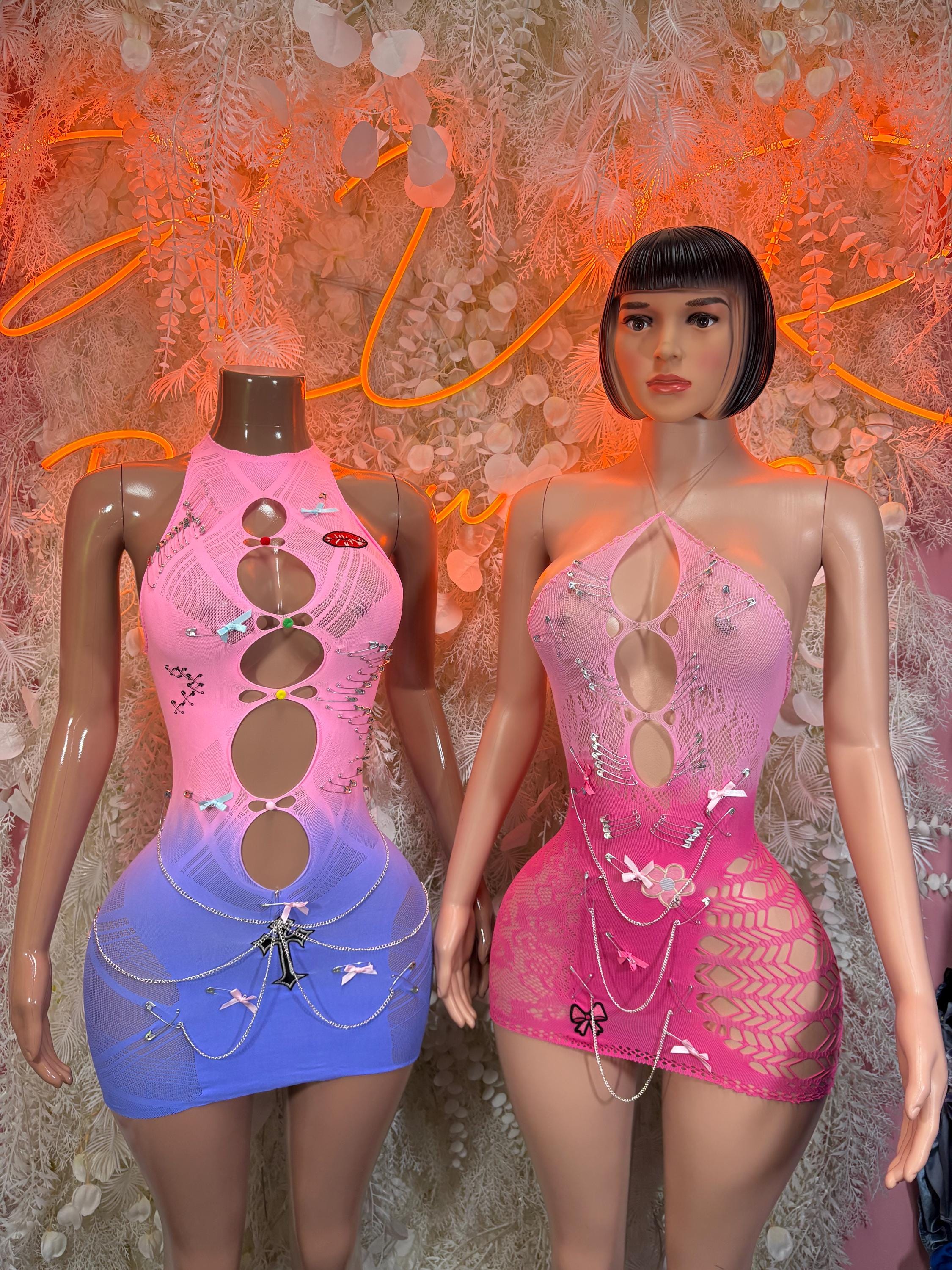 Two fishnet clubwear one-piece dresses, pink and blue gradient with cutout front