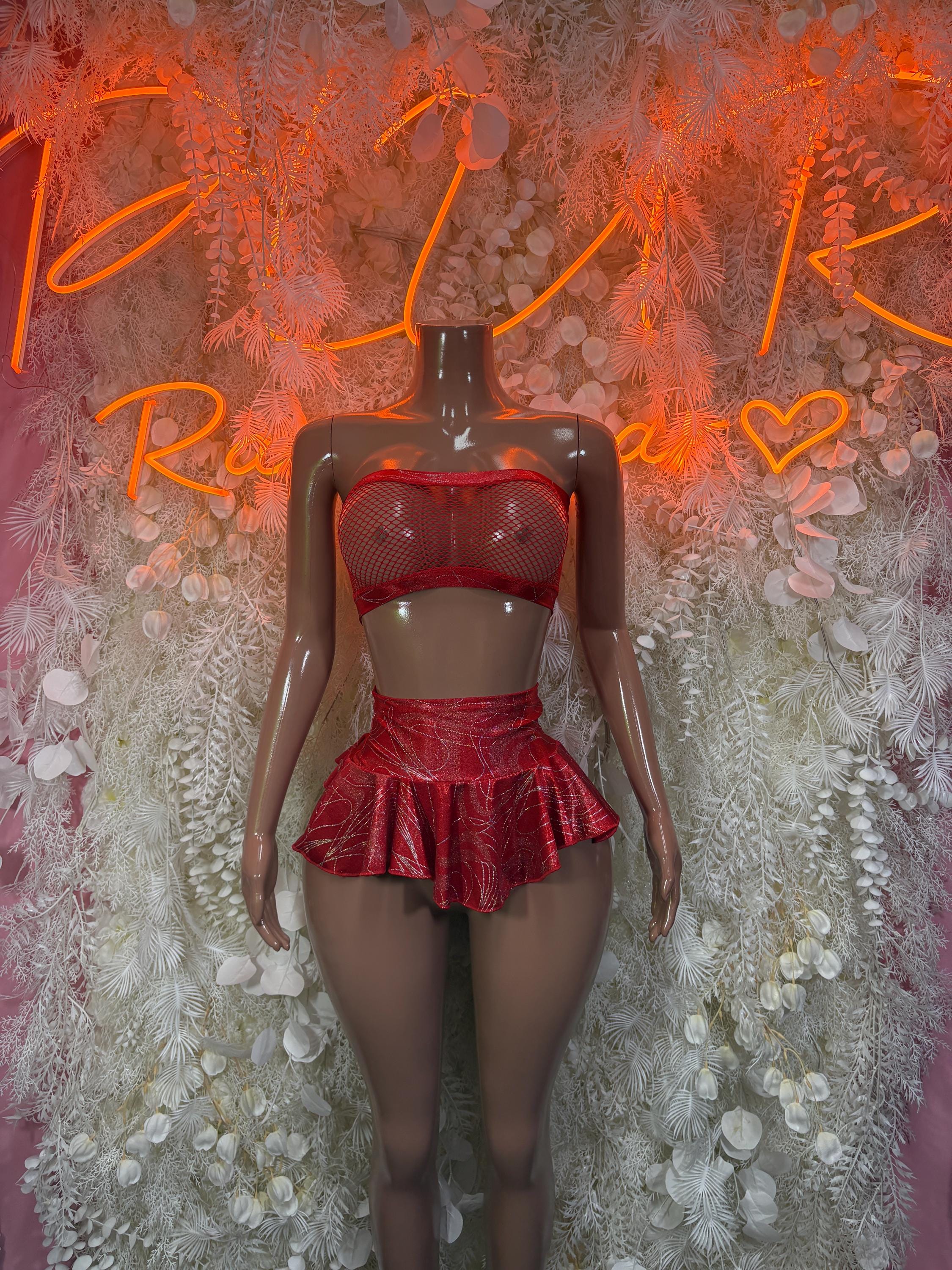 Red two-piece rave skirt set with mesh bikini top and ruffled mini skirt, back view