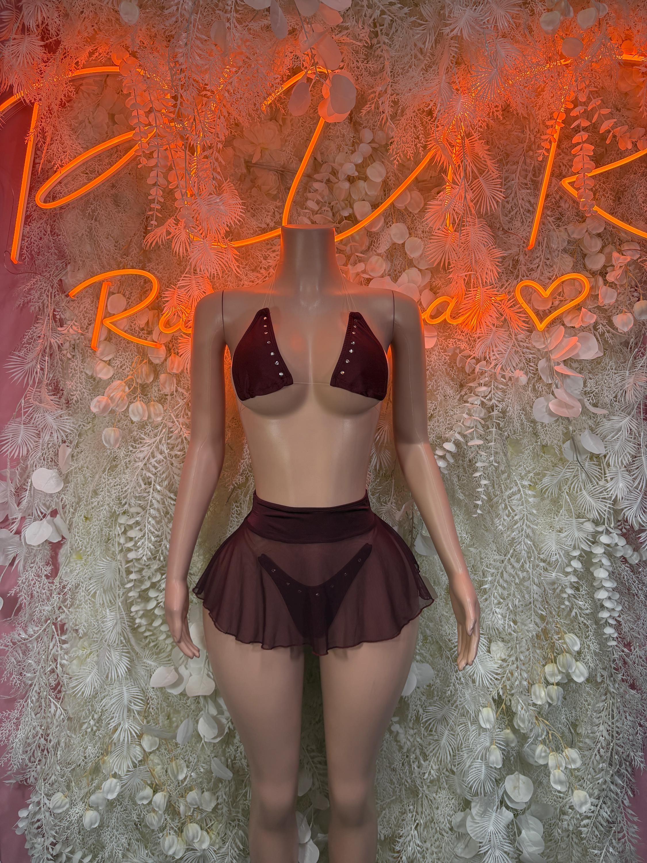 Burgundy two-piece festival skirt set with strappy mesh overlay and flared mini skirt