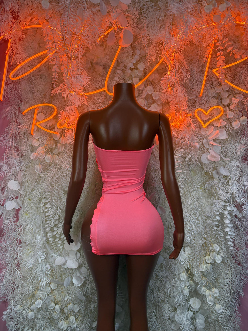 Pink ruched mini dress with scoop back, fitted sleeveless
