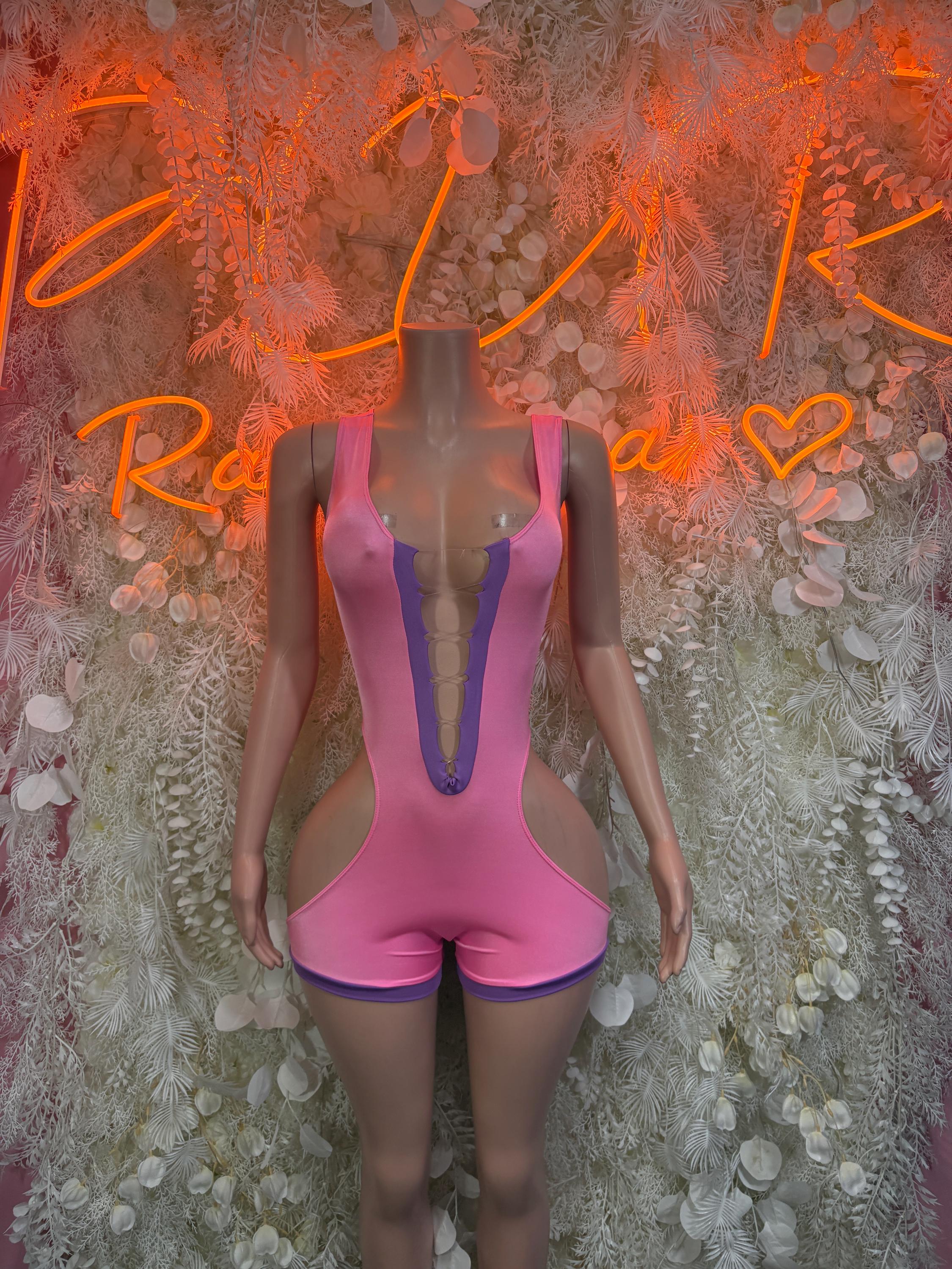 Pink high-cut rave bodysuit with wide straps and center cutout