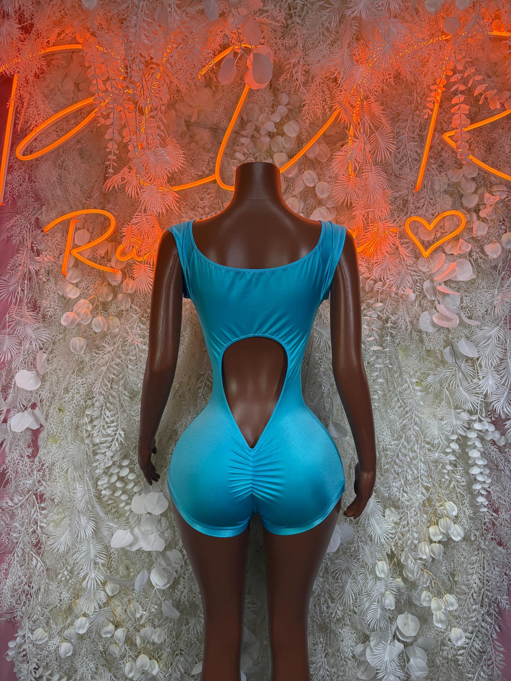 Turquoise blue sleeveless bodysuit with scoop back and heart-shaped cutout