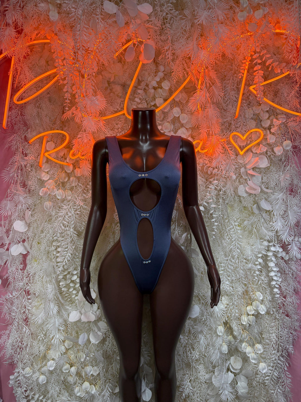 Blue one-piece rave bodysuit with chest cutout and open back, long sleeves