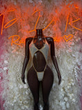 Rhinestone one-piece dancewear with V-neck front and cheeky cutout, light mesh
