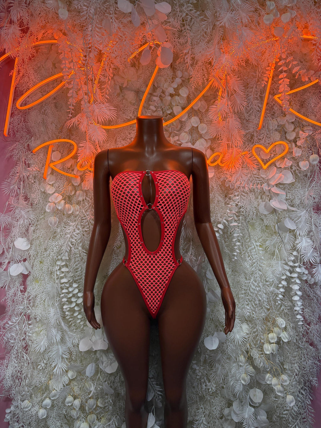 Red fishnet bodysuit with V-neck and keyhole front cutout