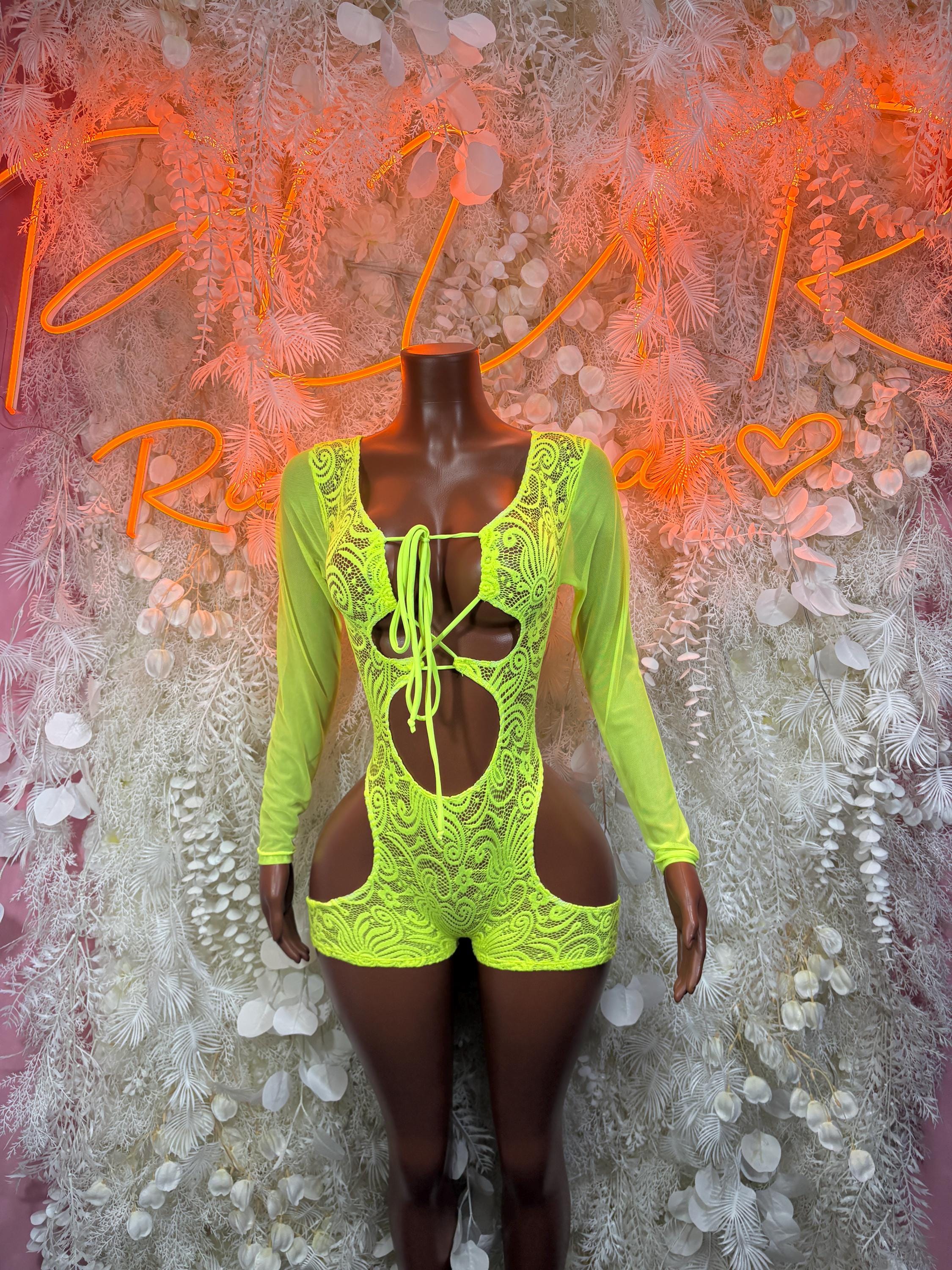 Neon green lace long-sleeve bodysuit with crisscross front lacing and cutouts