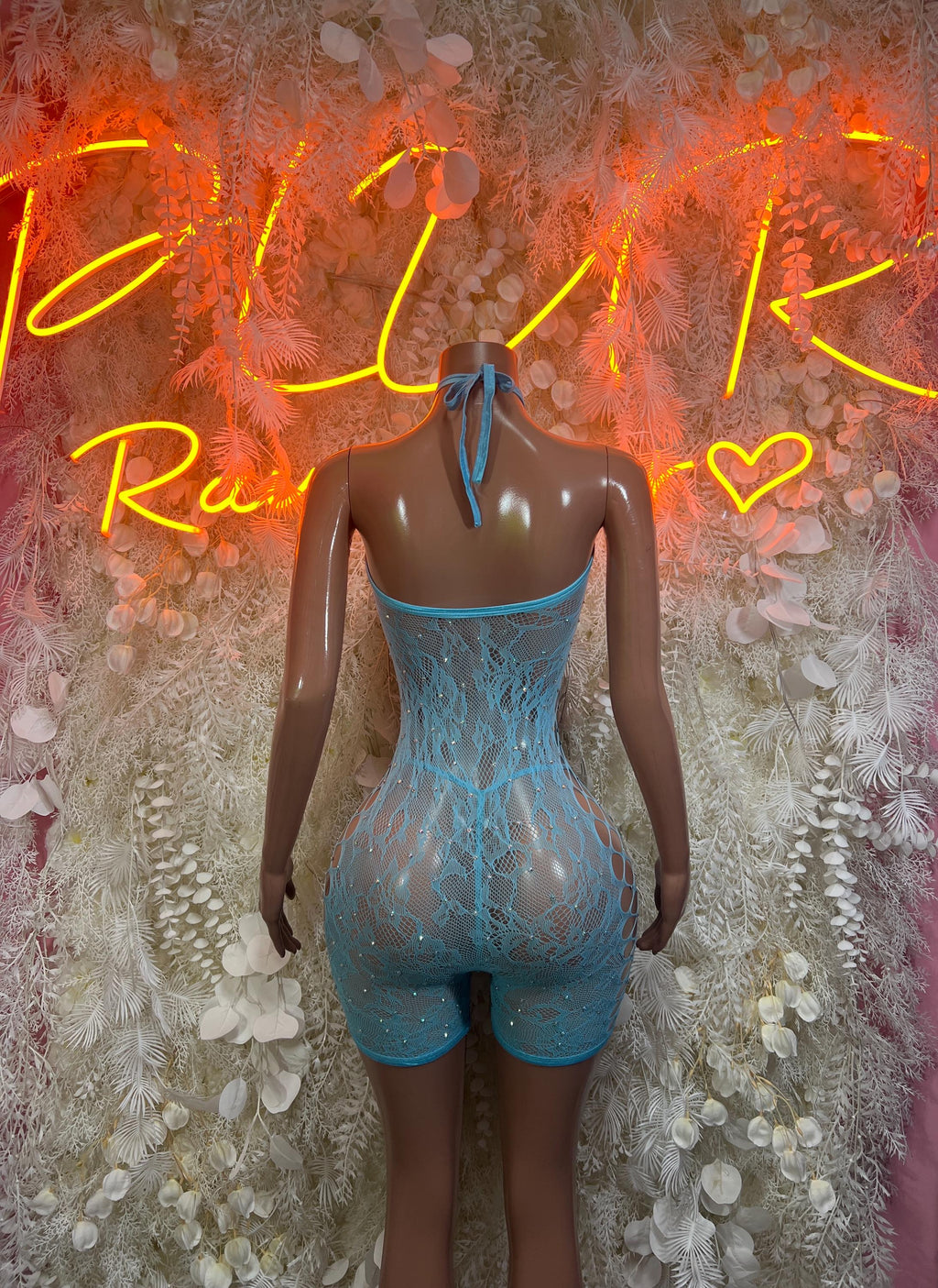 Blue fishnet one-piece halter bodysuit with open back and short legs