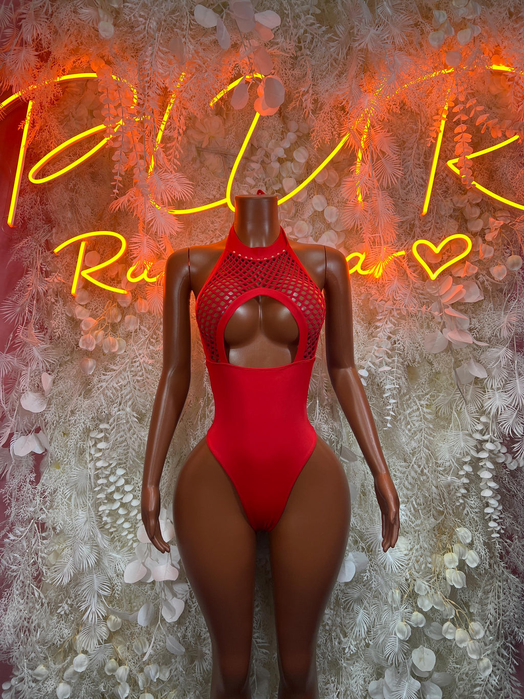 Red fishnet bodysuit one-piece with open chest cutout and high-cut legs