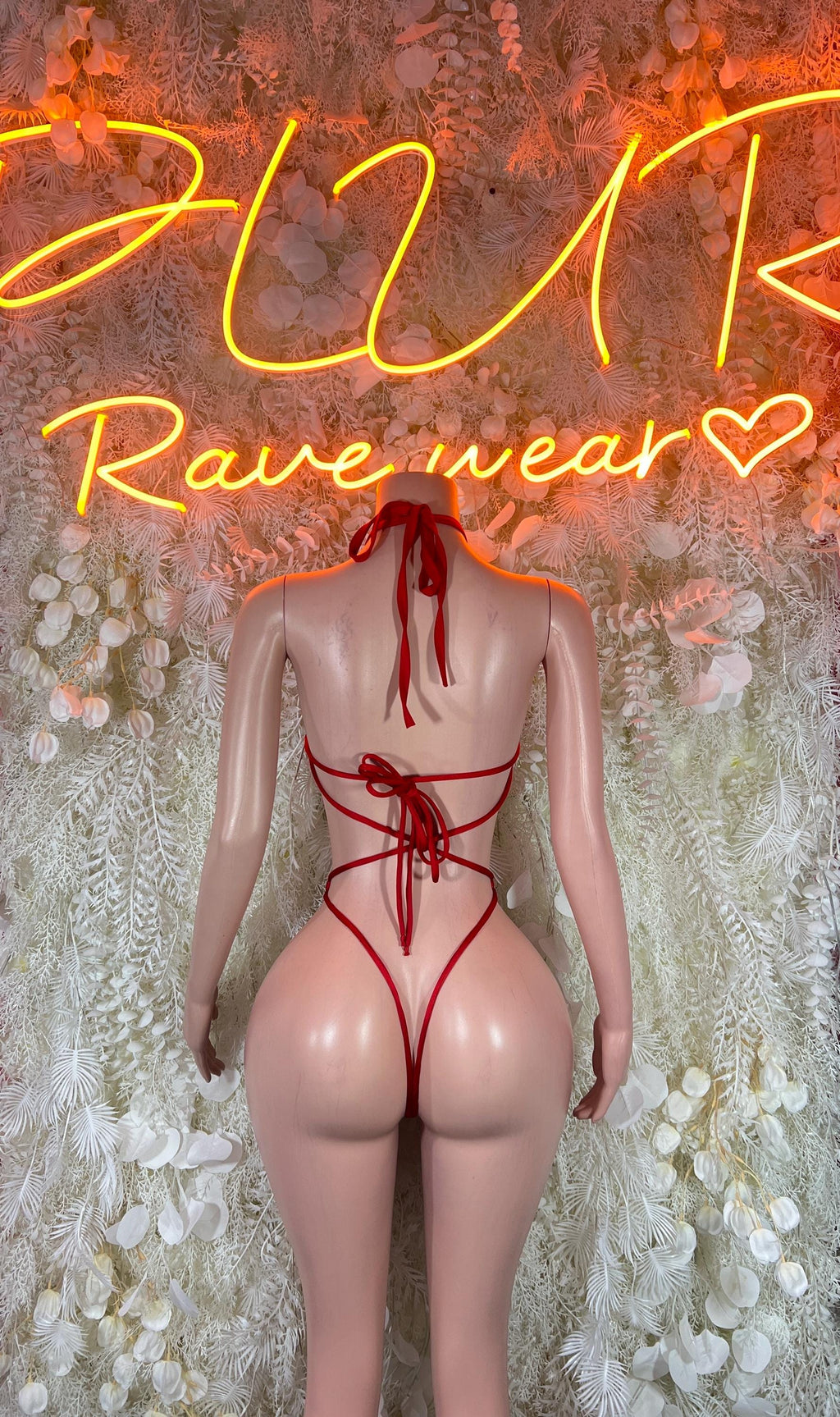 Red lace-up fishnet bodysuit with back tie detail and cheeky back