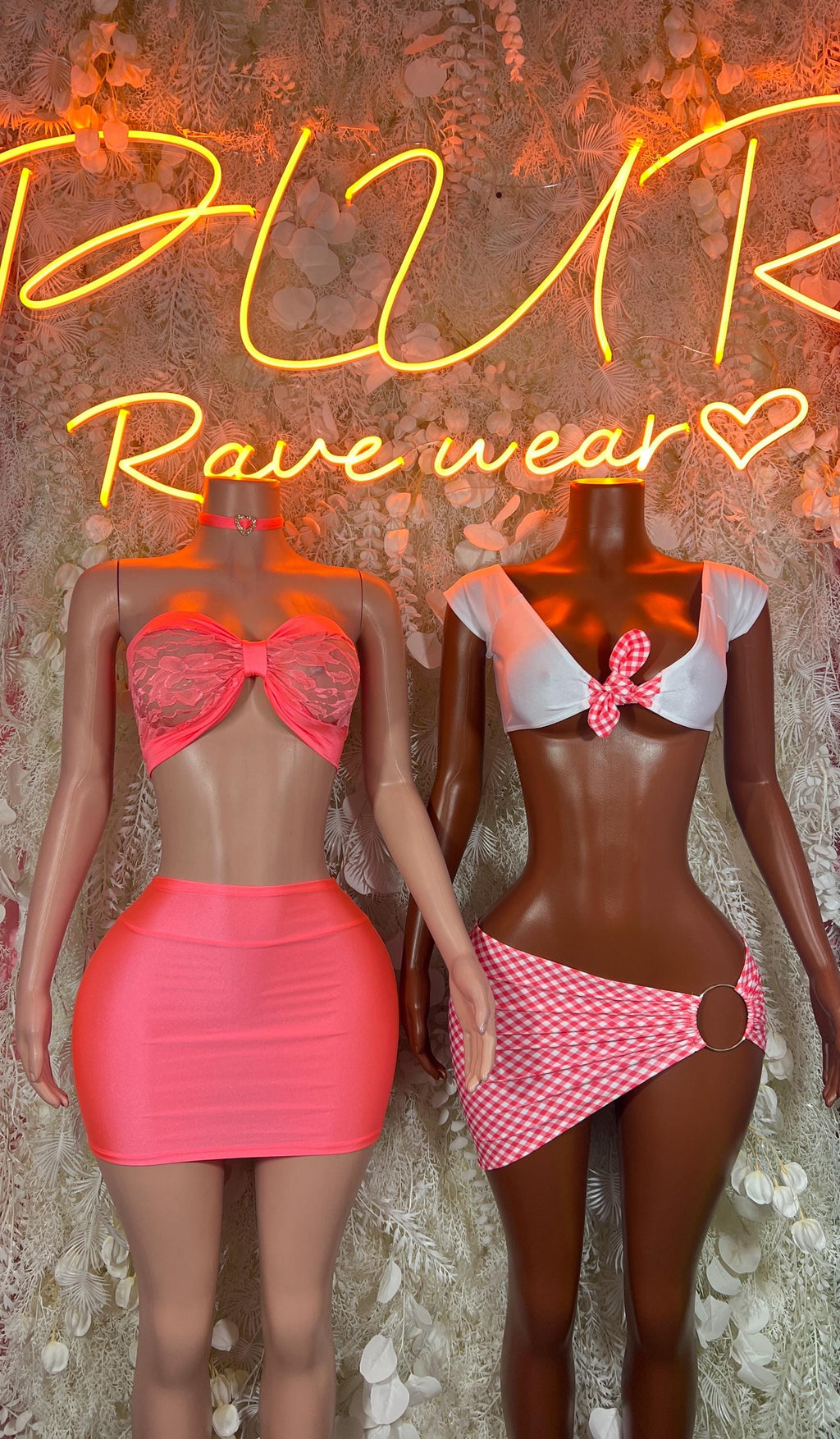 Pink heart bow crop top and mini skirt set on two models