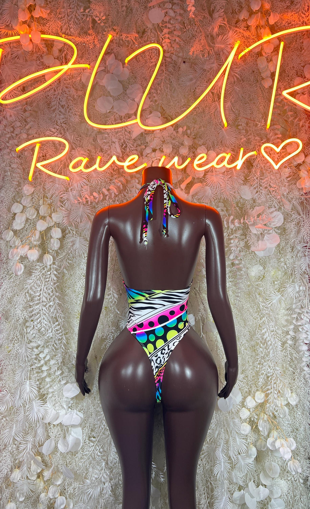 Multicolor halter one-piece bodysuit with geometric rainbow print and strappy back