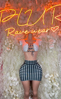 Two-piece festival set: light crop top and black-and-white check mini skirt