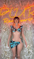 Teal and black animal-print two-piece skirt set with V-neck bra and mini skirt