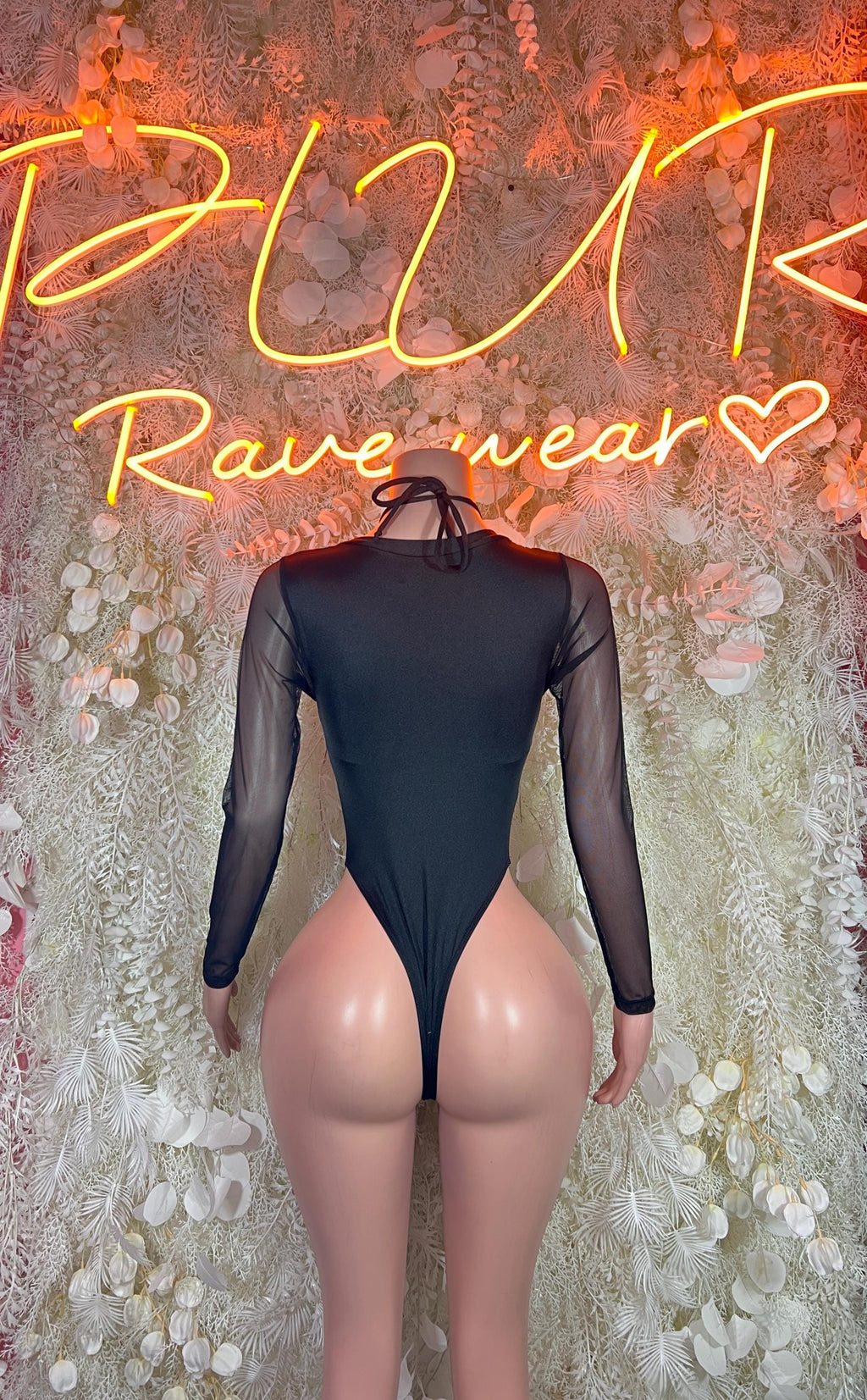 Black backless long-sleeve rave bodysuit with multicolor metallic print