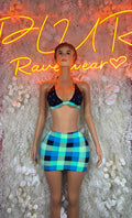 Two-piece plaid skirt set with dark halter bikini top and teal, black, blue skirt