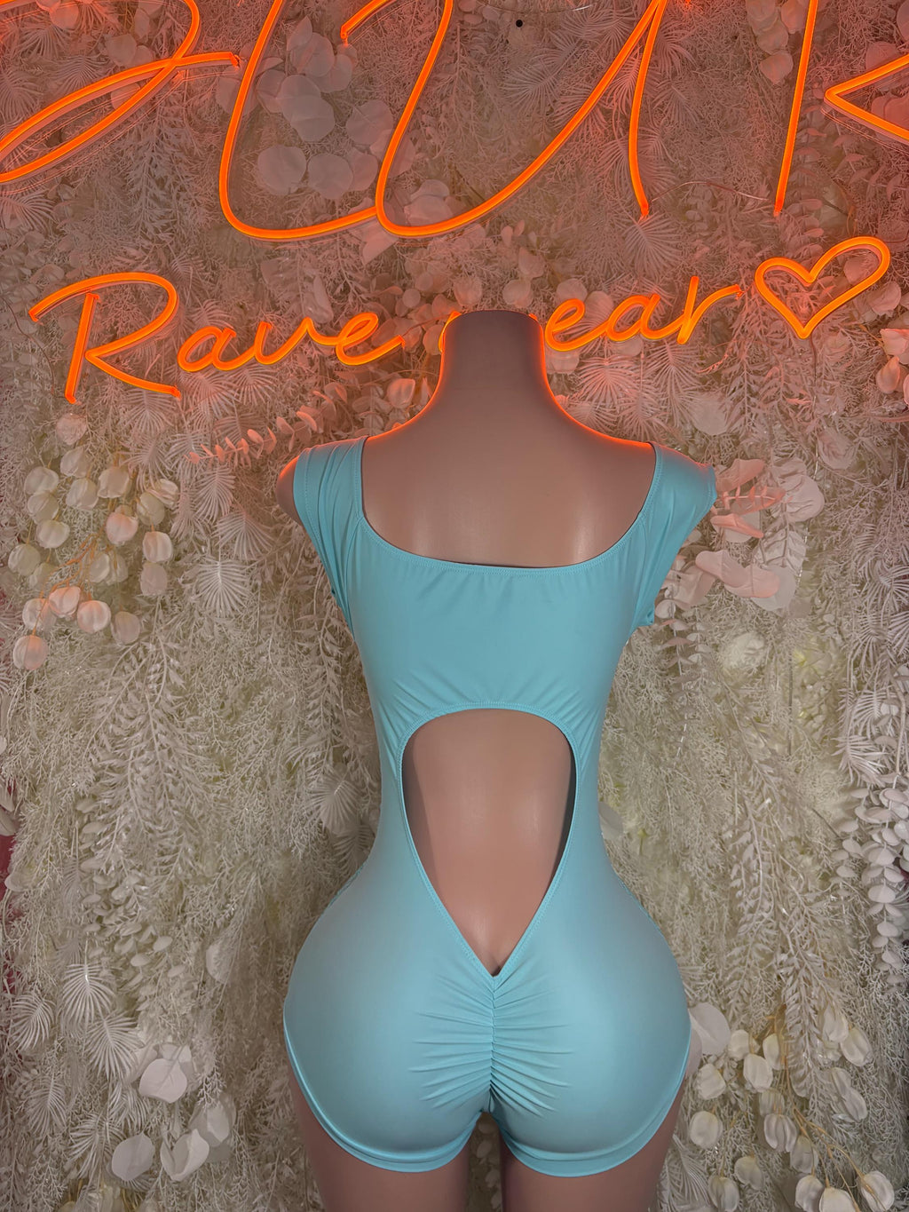 Aqua lace bodysuit with square back, deep V cutout, and ruched center seams