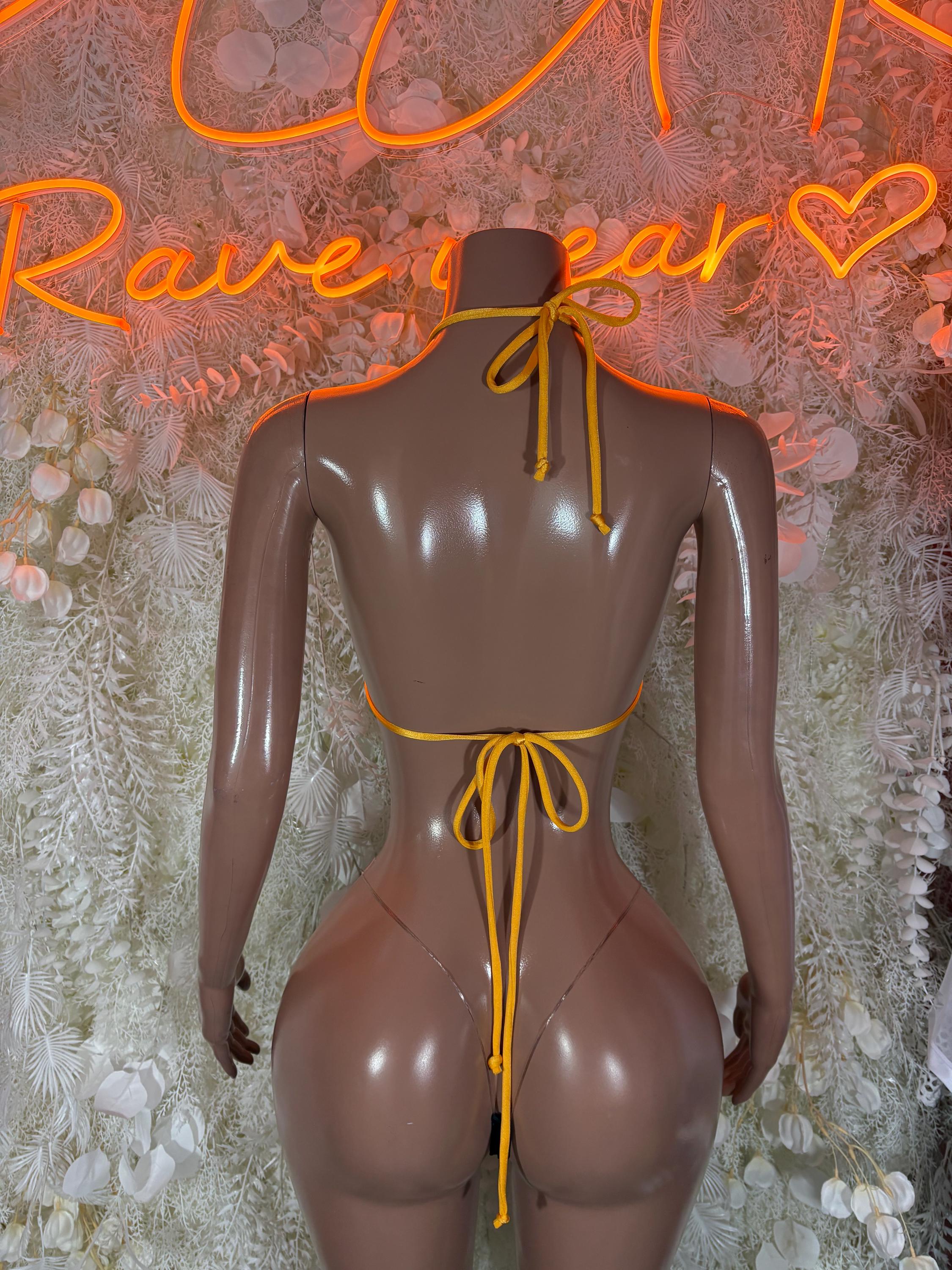 Jamaican flag bikini back view: yellow tie strings, green/black triangle top, thong
