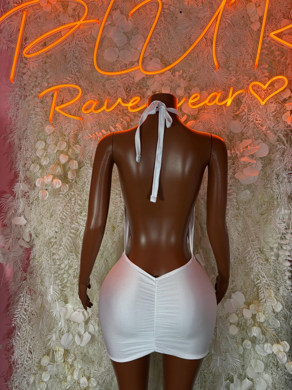 White halter mini dress with open-back tie straps