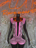 Pink lace bodysuit with long black lace-up panel at center front