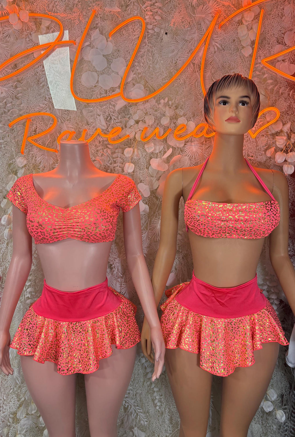 Coral cheetah-print crop top and flared mini skirt set on two models