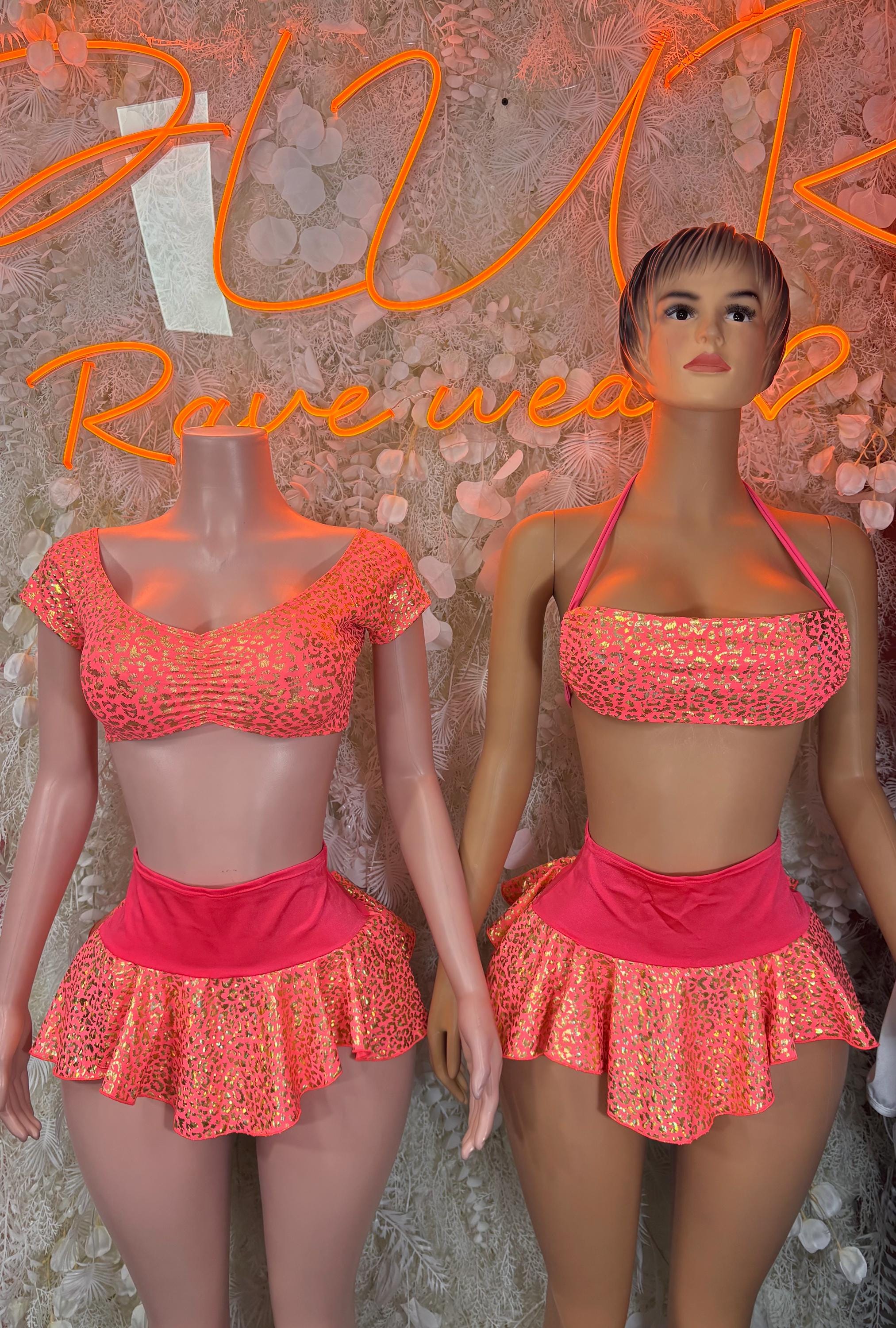 Coral cheetah-print crop top and flared mini skirt set on two models