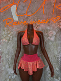 Red animal-print bikini top and ruffled mini skirt, two-piece festival rave set