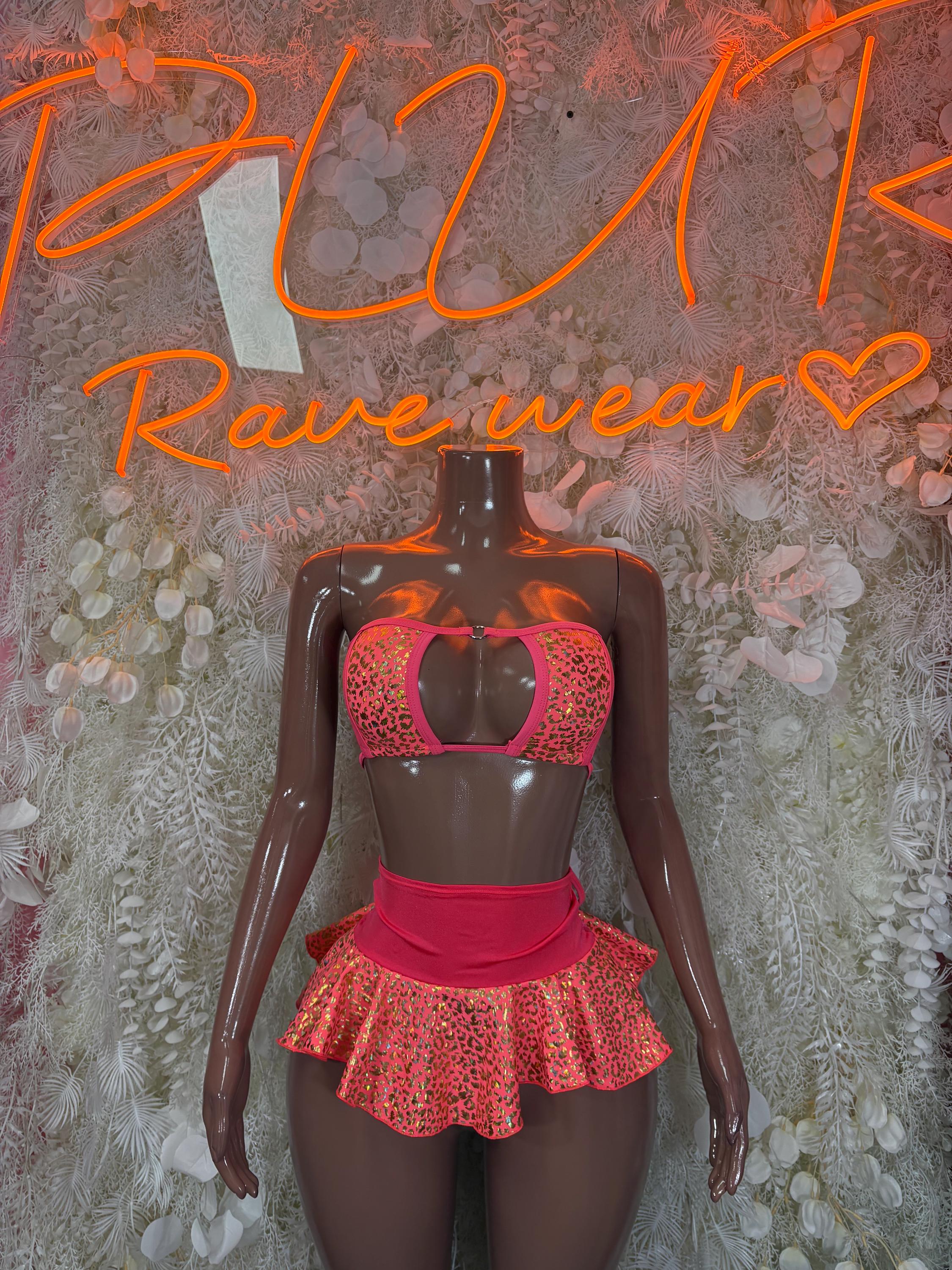 Coral cheetah print skirt set with heart-shaped cutout bikini top and ruffled mini skirt