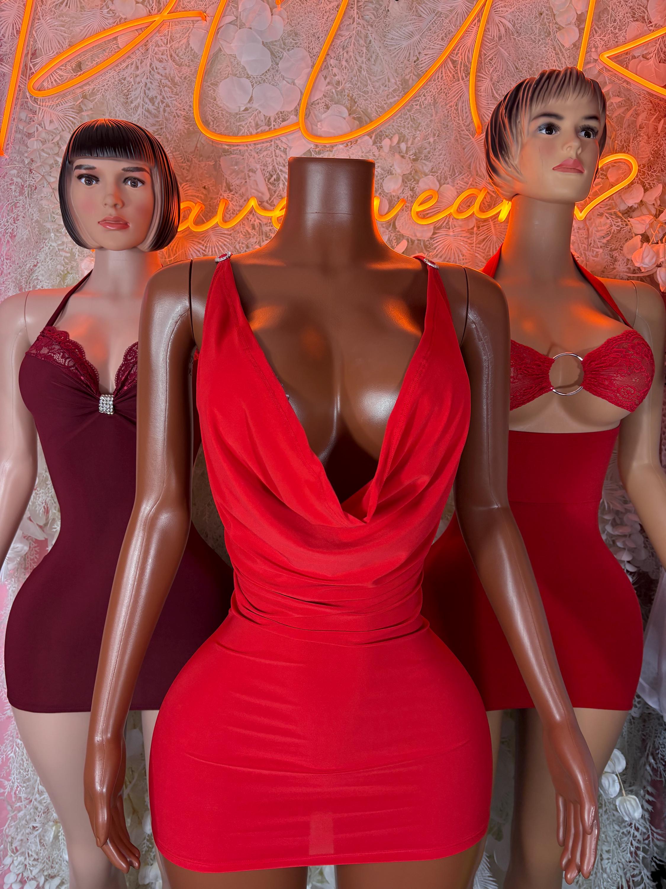 Red draped plunge mini dress with sleeveless V neckline and ruched waist