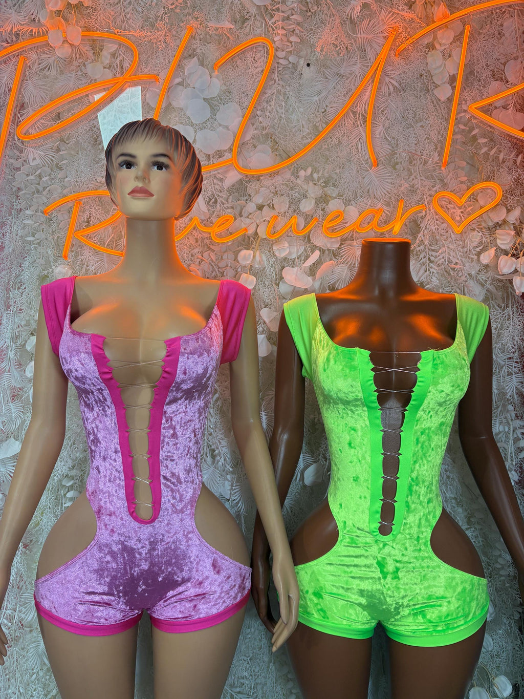 Purple and green velvet festival bodysuits with scoop necklines and cutout seams
