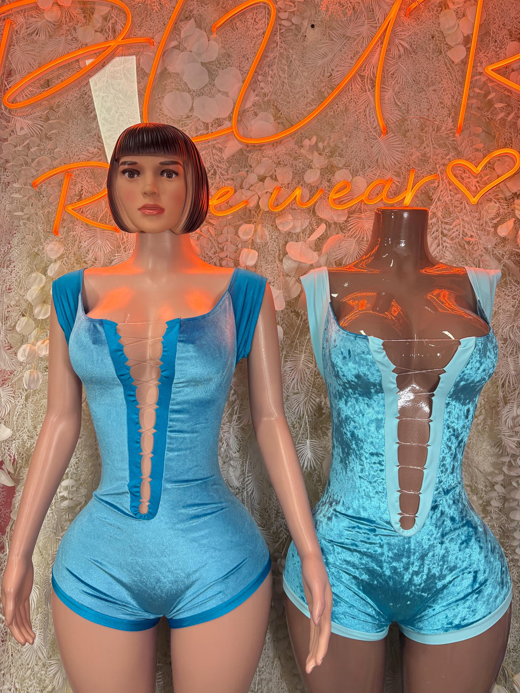 Blue sleeveless bodysuit showing front and back with ruched plunging design