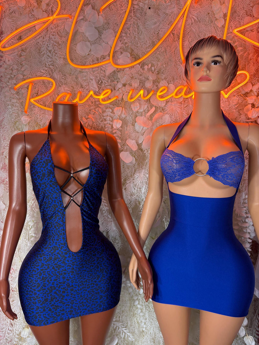 Blue leopard-print mini dress with crisscross lace-up front, styled on model