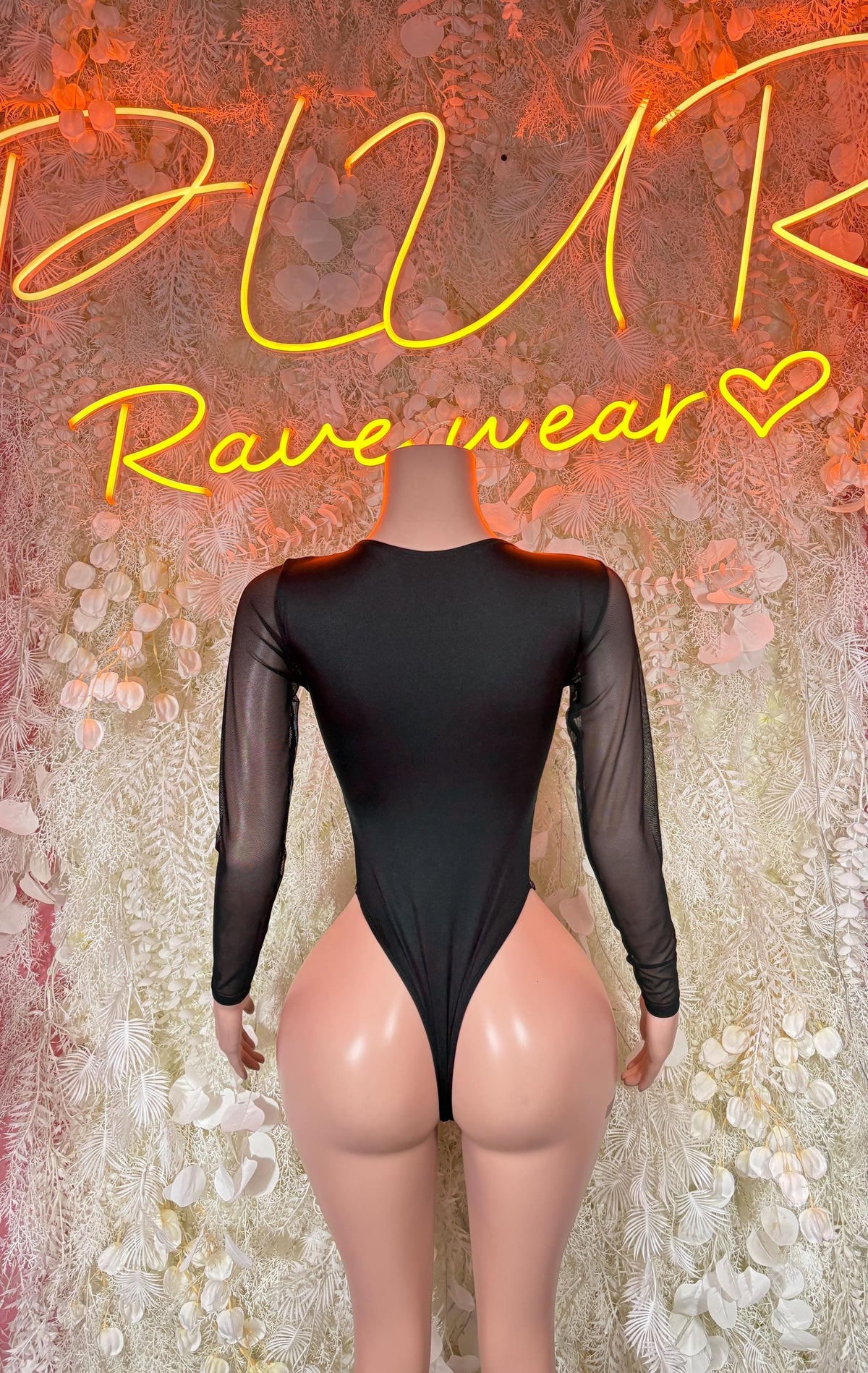 Black long-sleeve sheer bodysuit with deep back cut