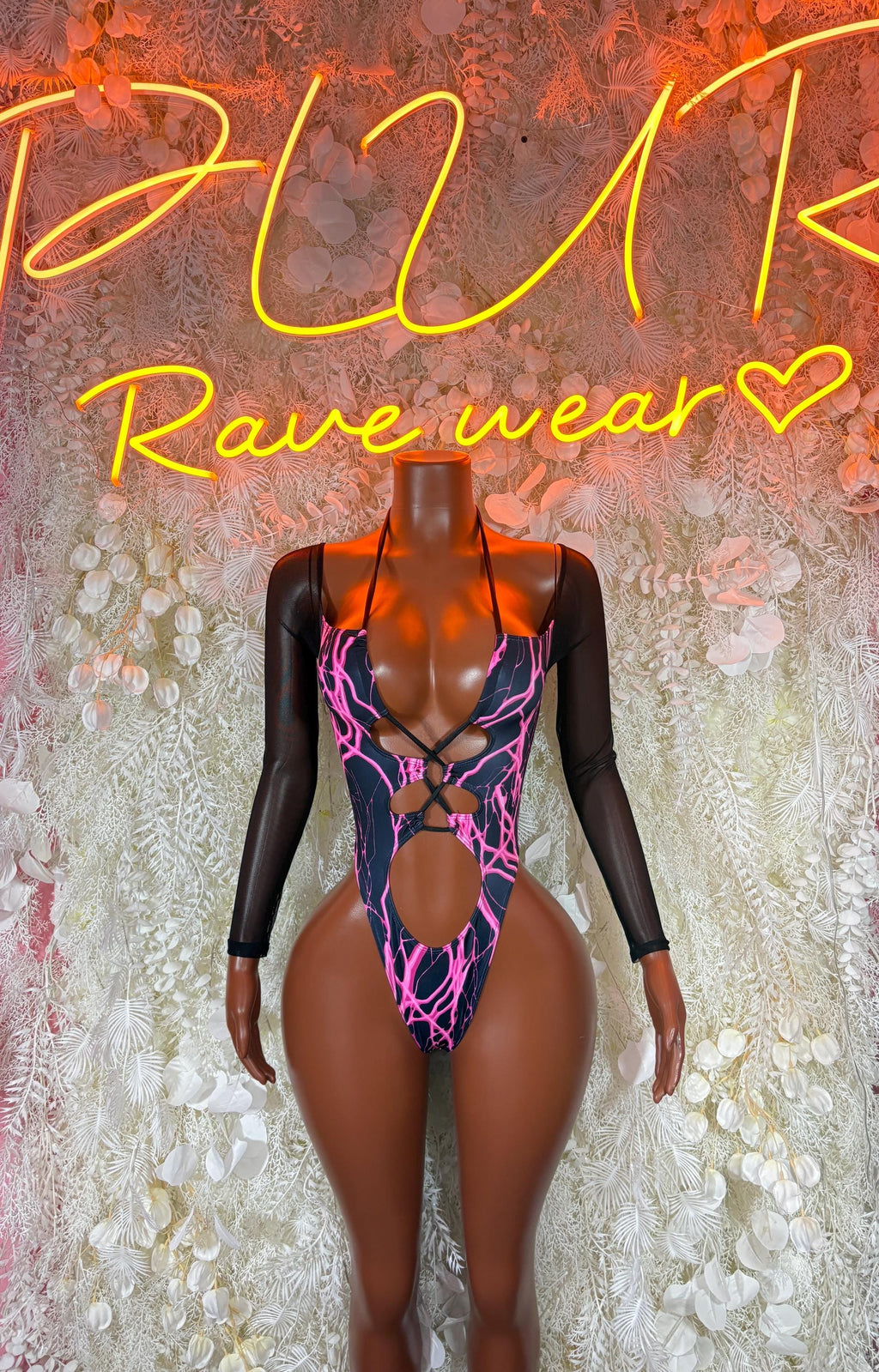 Black long-sleeve bodysuit with pink lightning bolt print and deep V neckline