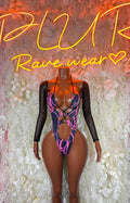 Black long-sleeve bodysuit with pink lightning bolt print and deep V neckline