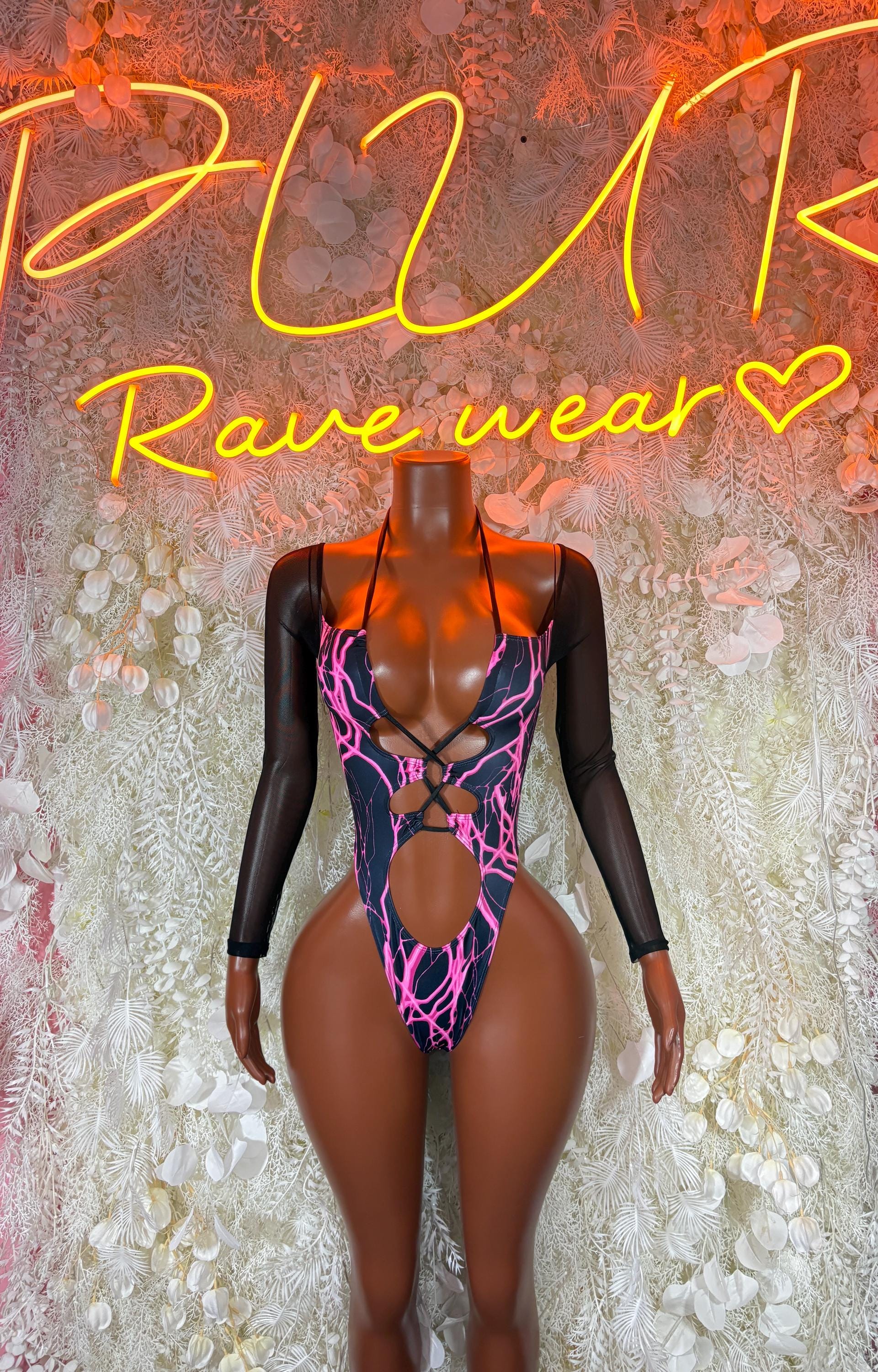 Black long-sleeve bodysuit with pink lightning bolt print and deep V neckline