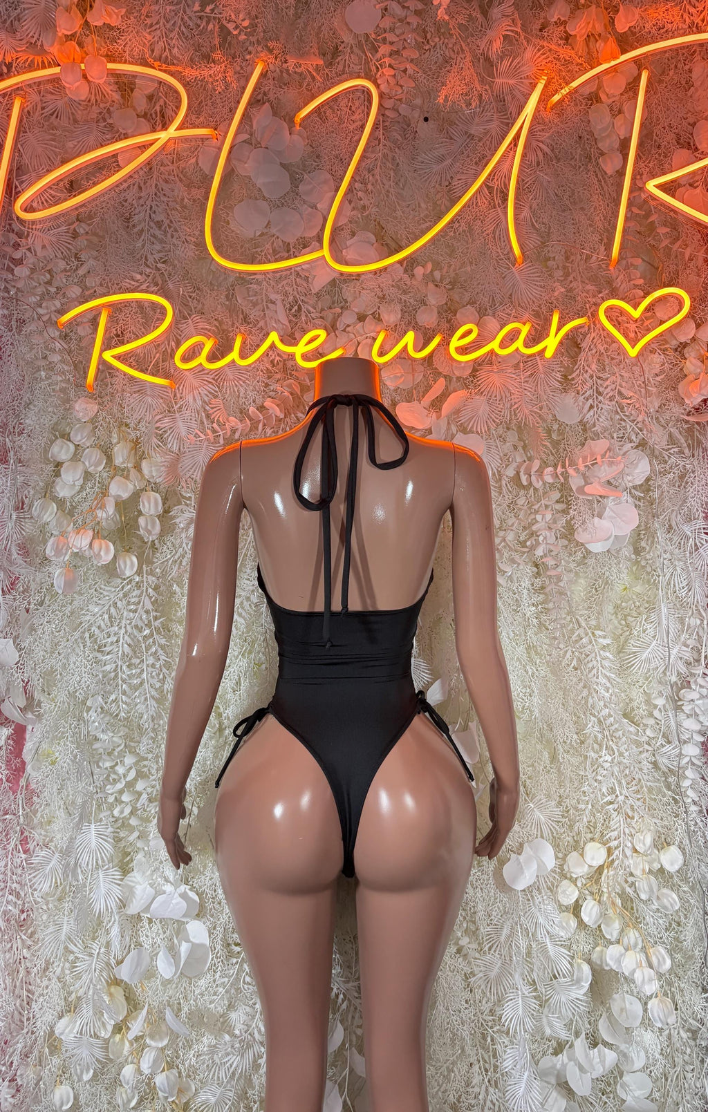Backless rave bodysuit with purple-pink lightning print and halter tie straps