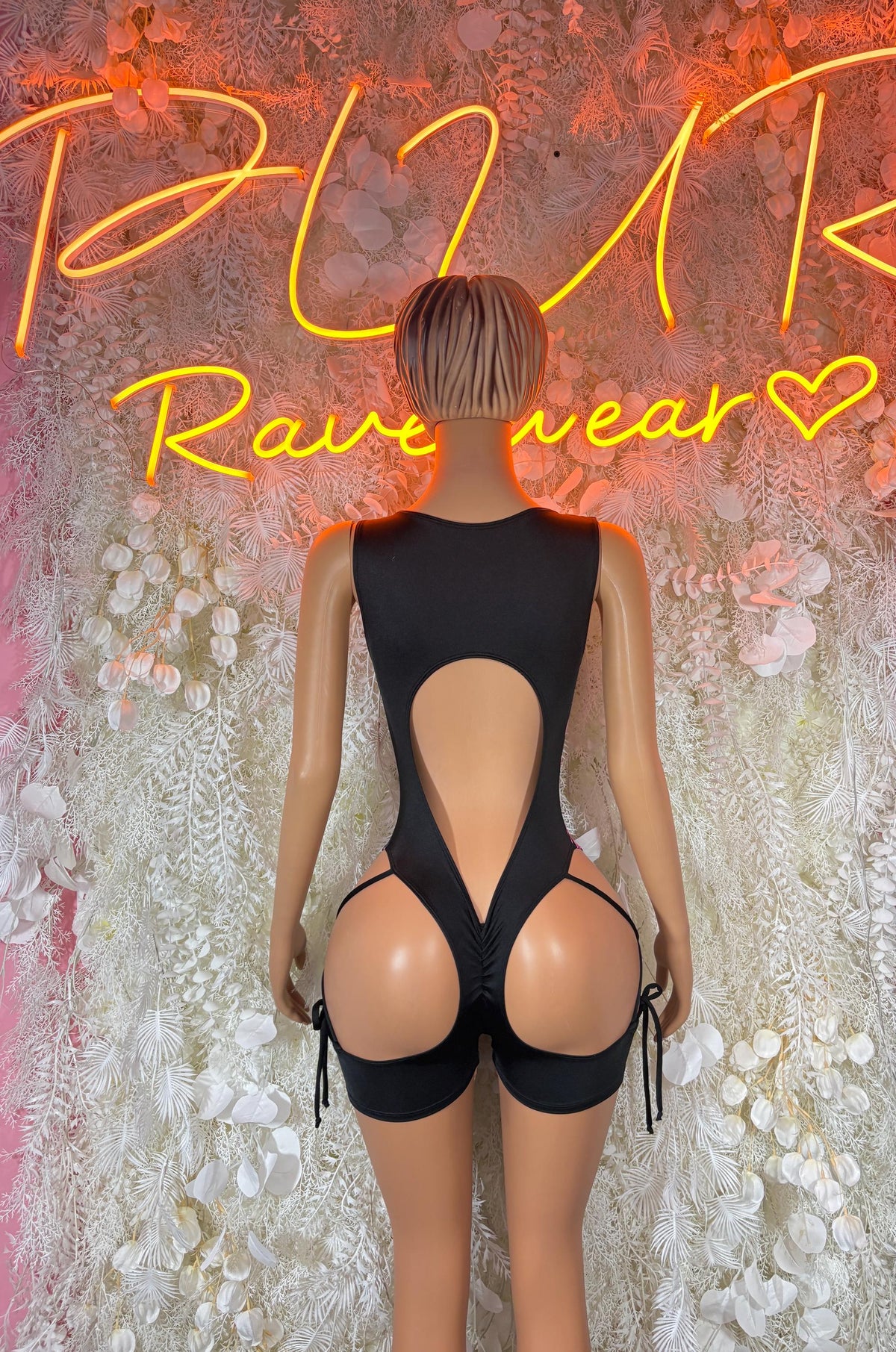 Bottlegirl backless lightning bolt romper bodysuit in black with pink and purple straps