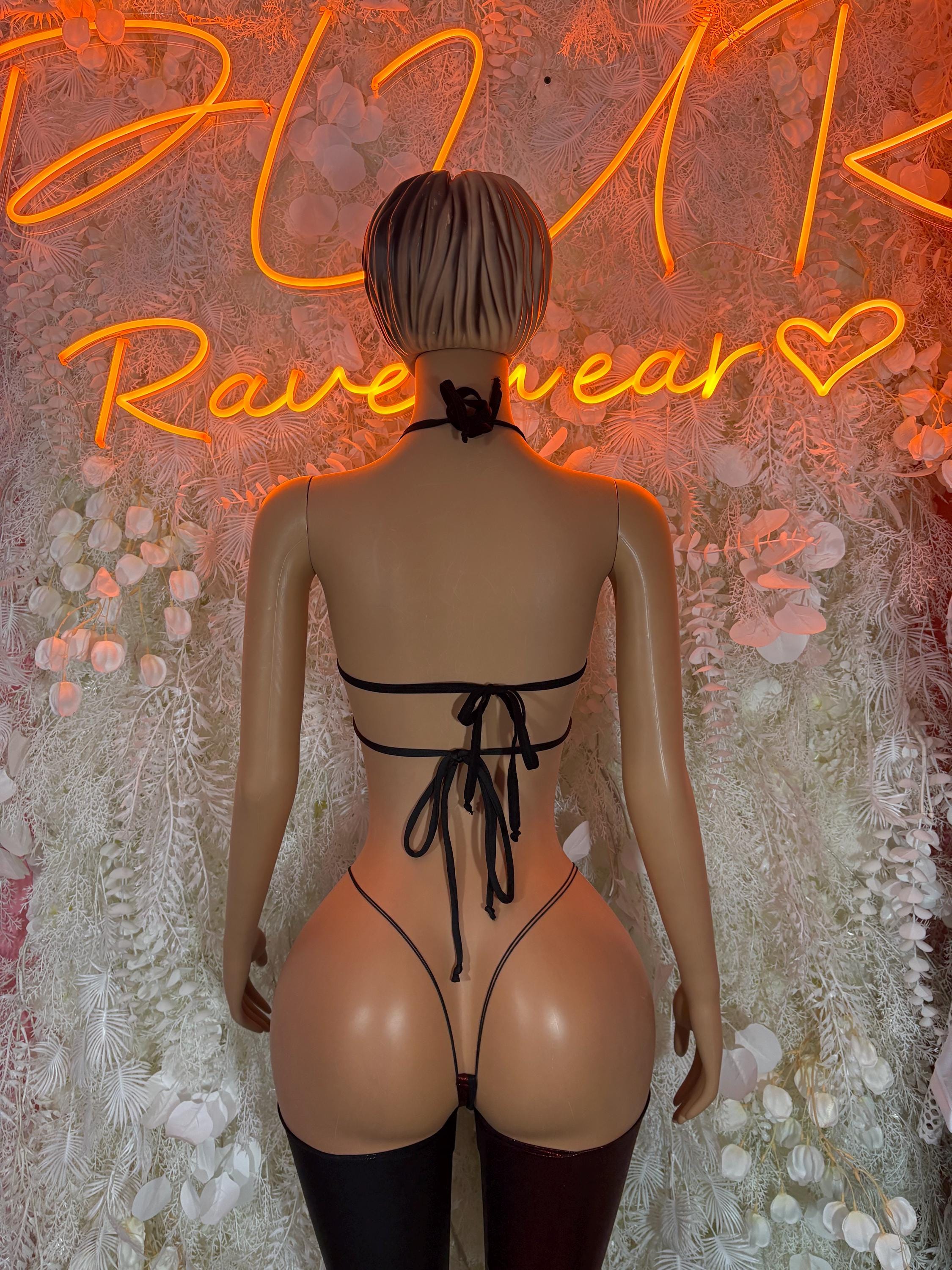 Harley Quinn two-piece rave outfit, black back view: strappy bra and tie-back bottoms
