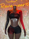 Rave two-piece outfit: long-sleeve crop top with black high-waist shorts, black and red