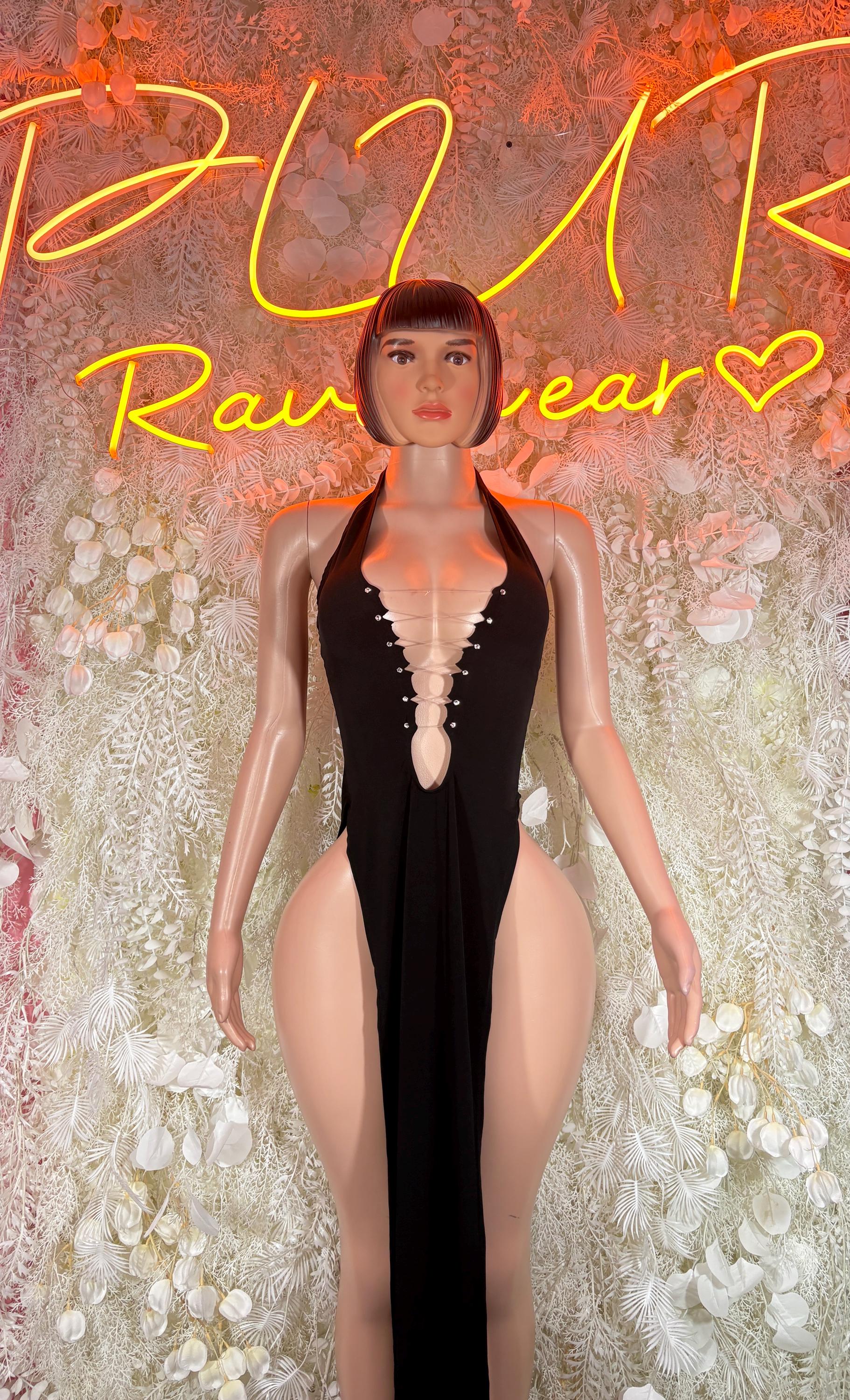 Black dance gown with deep V neckline and sheer strap detailing